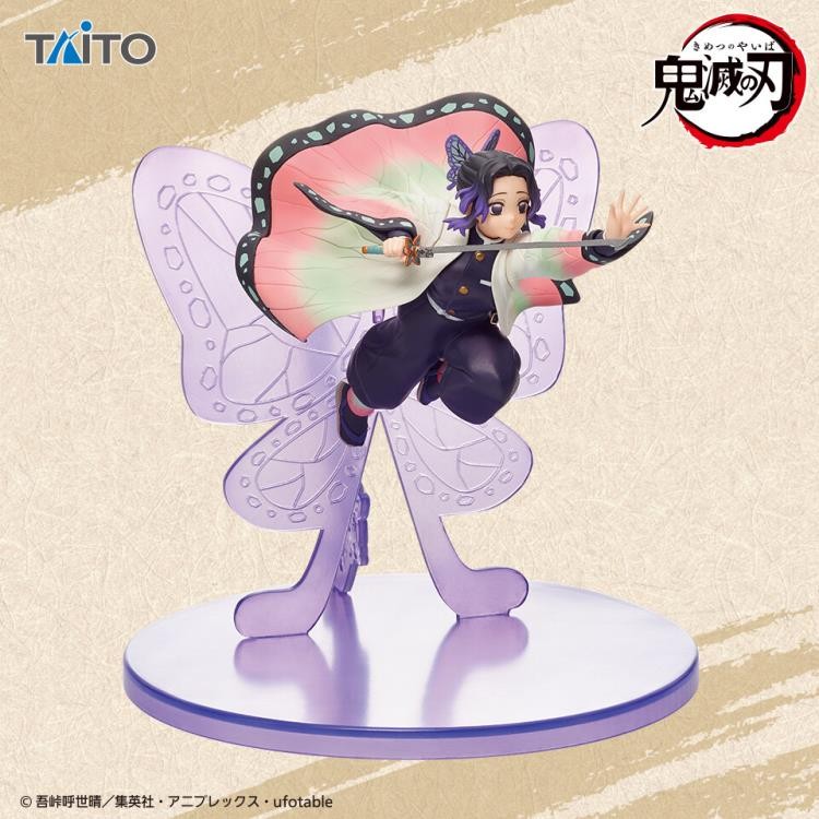 Figurine Shinobu Demon Slayer presse livre