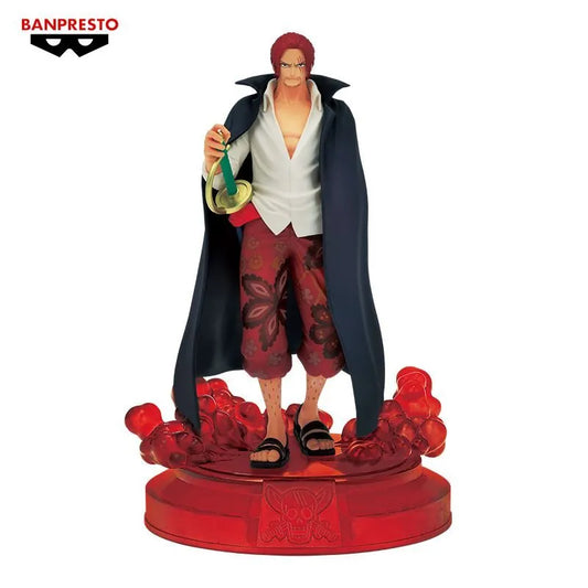 Figurine de Shanks de 16 cm issue de la gamme The Shukko par Banpresto. Shanks est représenté dans une posture élégante et confiante, capturant son charisme légendaire. Parfait pour les fans de One Piece à la recherche d'une pièce unique à ajouter à leur collection.