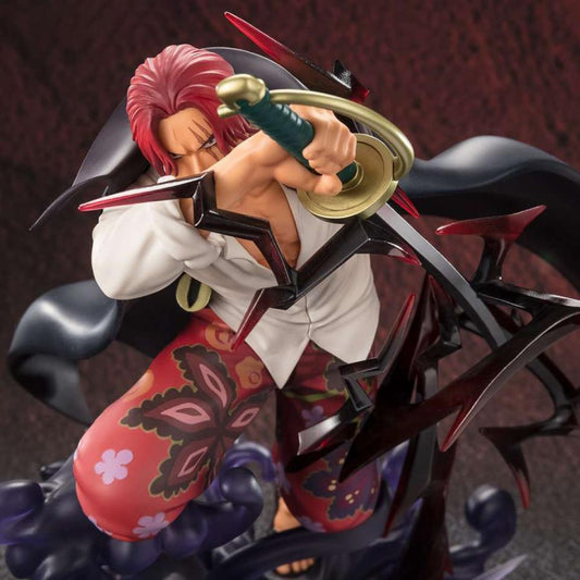 Figurine de Shanks Figuarts Zero de Bandai montrant l'Empereur des Mers dans une pose intense et dynamique, prête à dégainer son sabre. Les détails soignés et l'expression déterminée reflètent parfaitement la force légendaire du personnage.